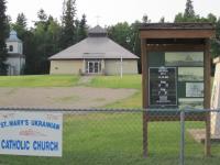 Historical kiosk erected beside highway in the Summer 0f 2014 showing the famous "Mountain Road Church".